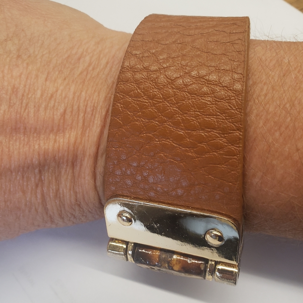 Brown leather bracelet.